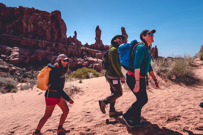 Arches Full Day Small Group Tour & Hike - Delicate Arch hike: the big viewpoint, plus Wolfe Ranch and petroglyphs
