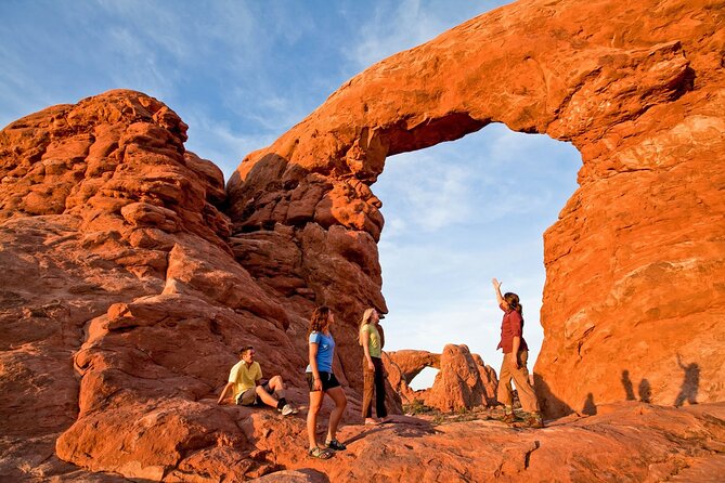 Arches National Park Morning Tour - The walking part: short hikes, sandy patches, and smart footwear