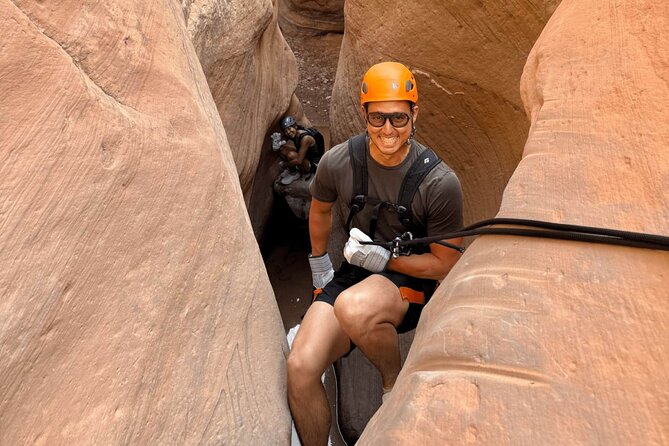 Discover Moab Rappelling on a Private Canyoneering Adventure - Longbow Arch Hiking: Petroglyphs, Dinosaur Tracks, and Scrambling Reality
