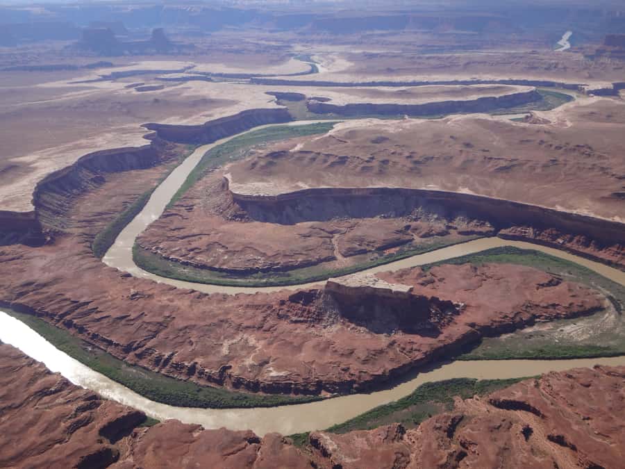 From Moab: Canyonlands 4x4 Drive and Calm Water Cruise - White Rim and Shaffer Trail switchbacks: the driving that teaches the canyon