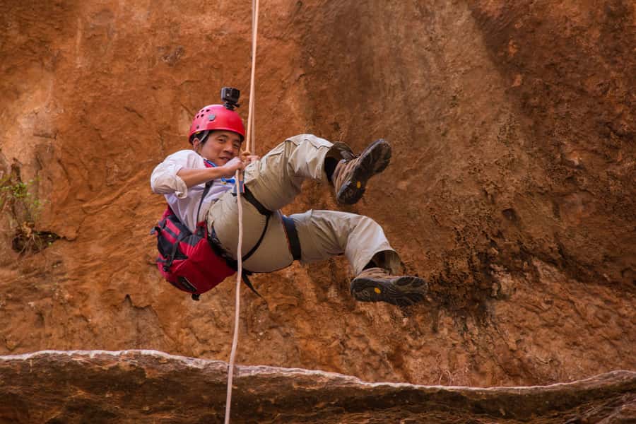From Moab: Rock of Ages Moderate Rappelling Obstacle Course - Slot canyon travel: potholes, careful footing, and gear rhythm