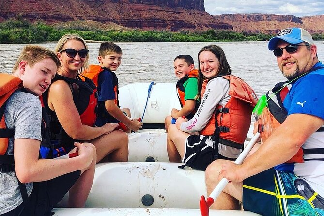 Moab Afternoon Half Day Rafting Trip - Colorado River - Paddle time on the Colorado River: stories, dad jokes, and cool-off moments