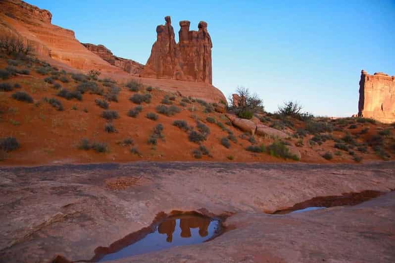 Moab: Arches National Park Sunset Tour - Starting at Moab Adventure Center: how the evening gets set up