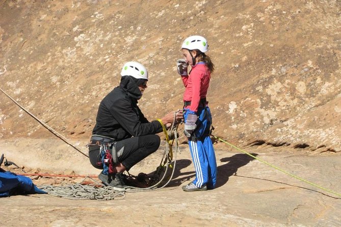 Moab Canyoneering Experience - The first rappel: a 90-foot drop into a water-carved chamber
